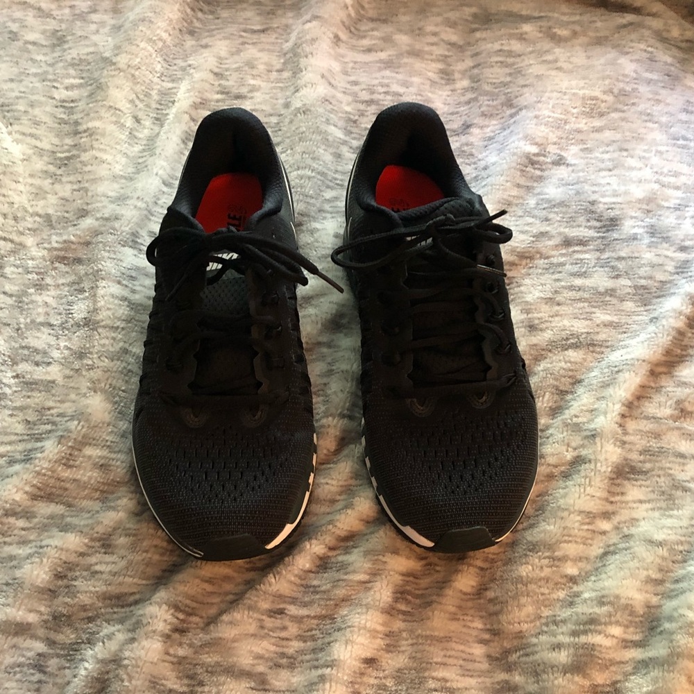 Black Nike running shoes